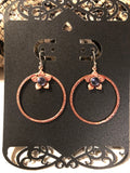 E117 SS/copper hoop & daisy w/ 5 mm Iolite stone center