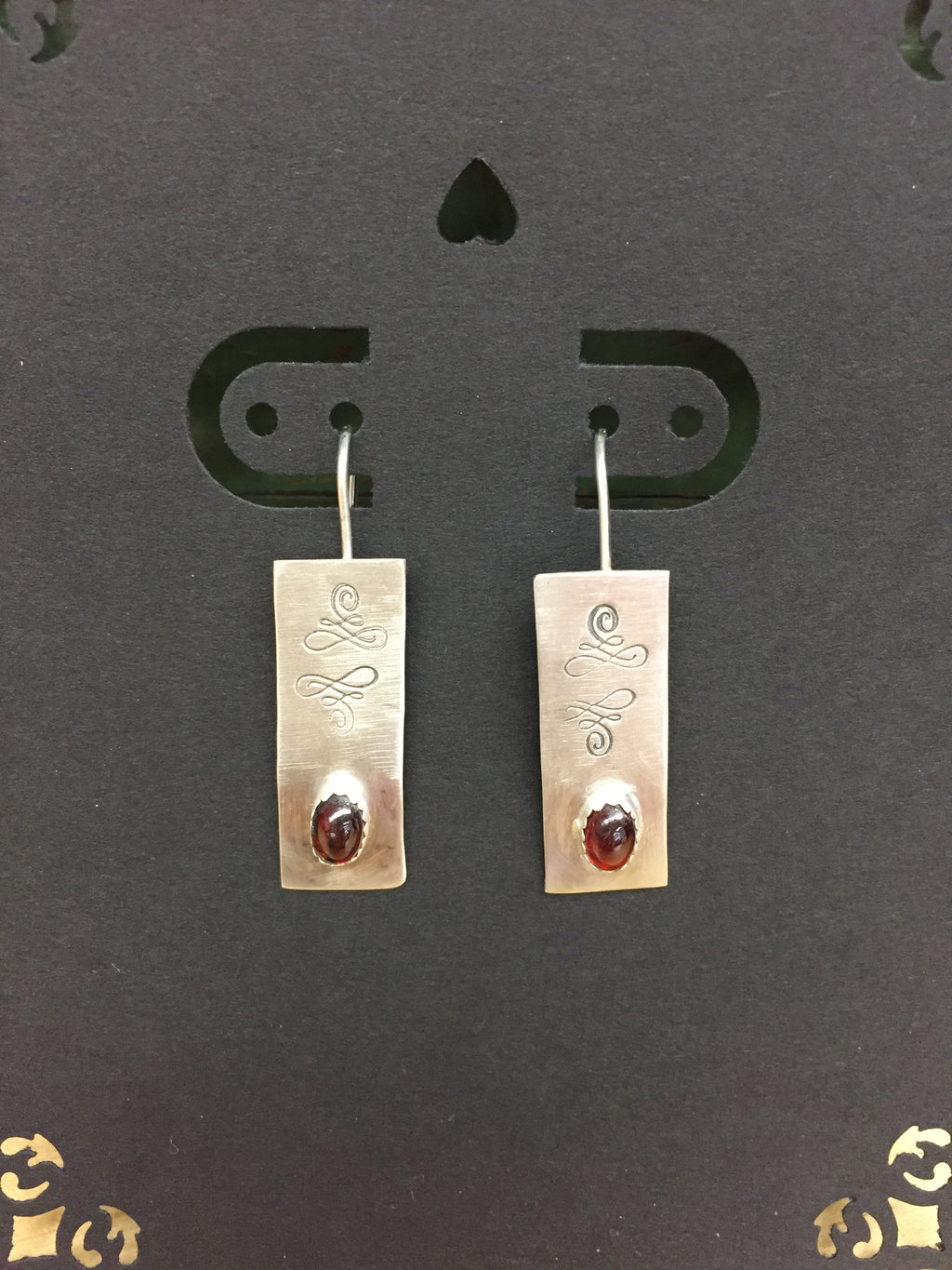 E81  Sterling Silver stamped Garnet Earrings