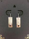 E81  Sterling Silver stamped Garnet Earrings