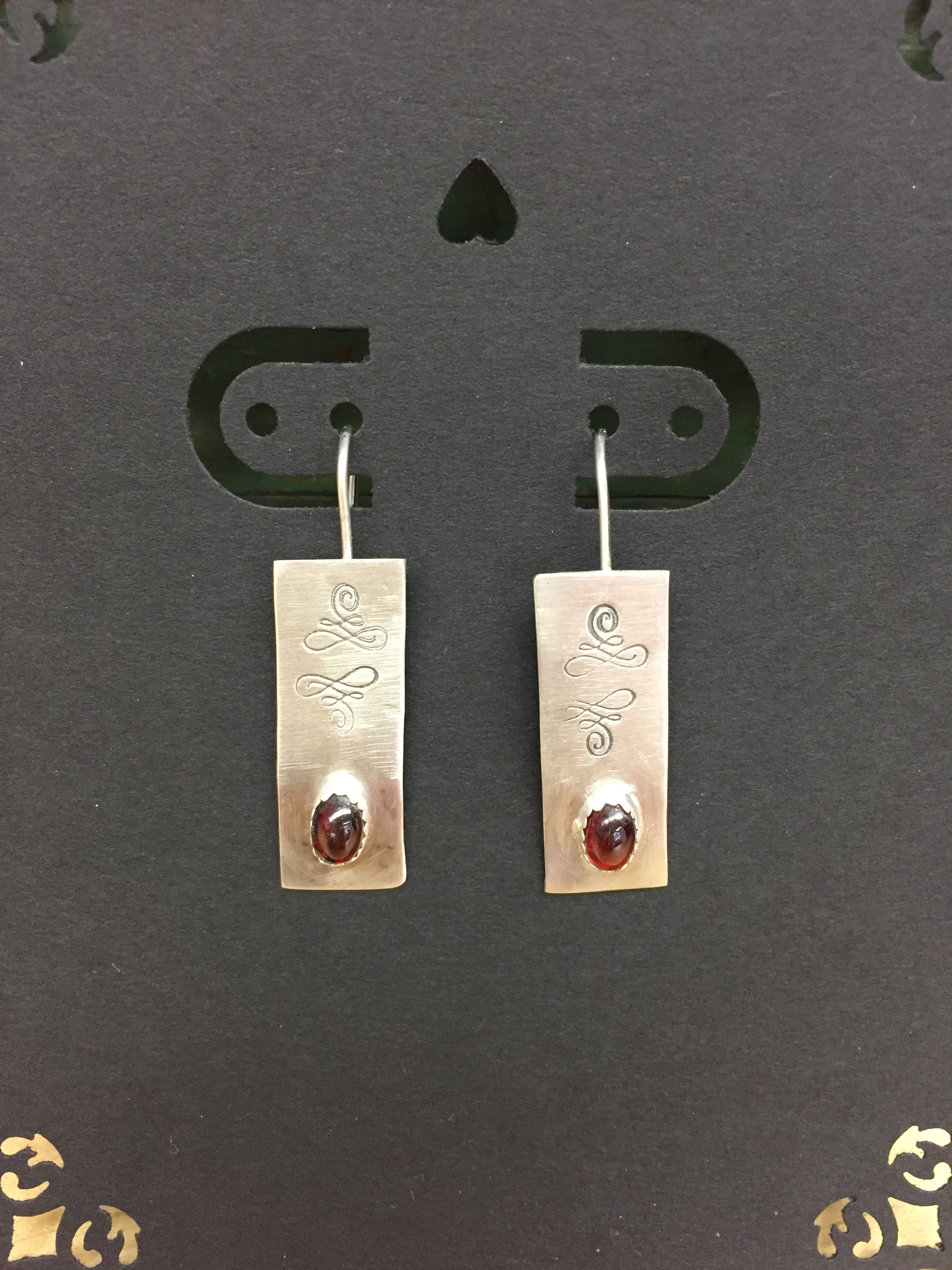 E81  Sterling Silver stamped Garnet Earrings