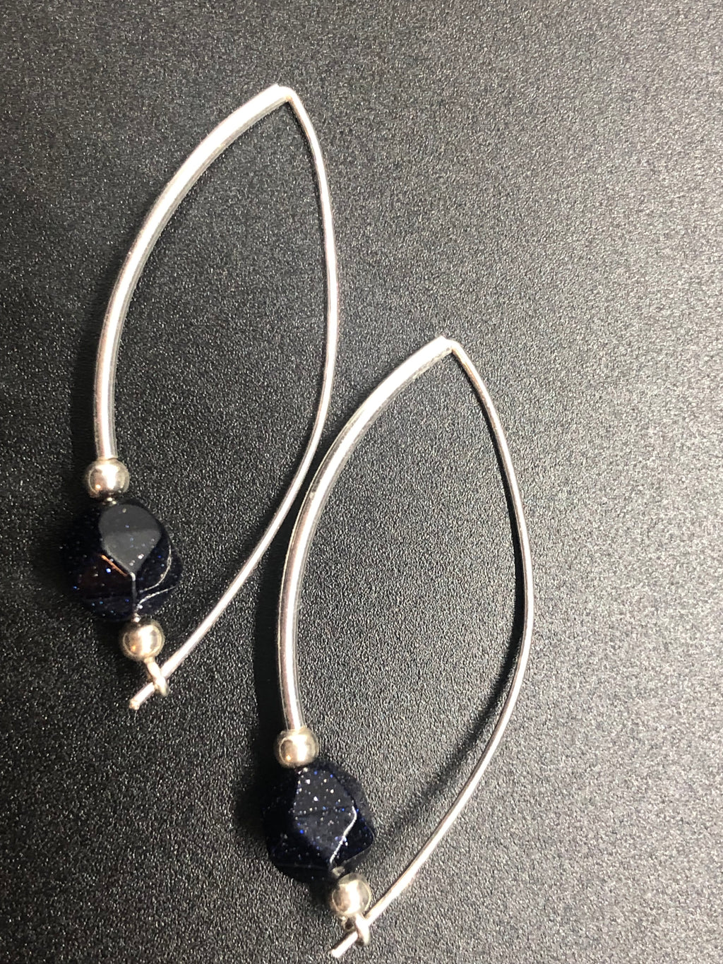 E146  ‘Around the Bend’ SS & Blue Goldstone earrings