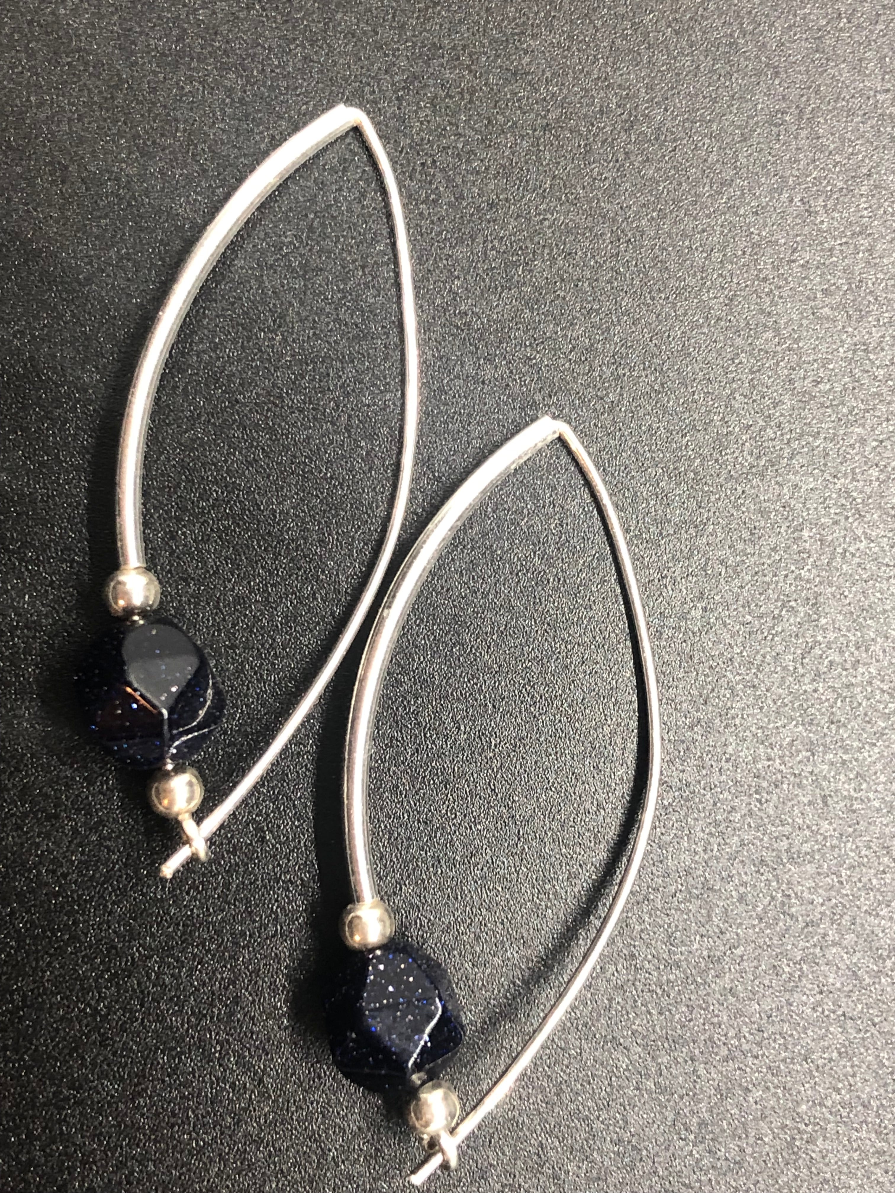 E146  ‘Around the Bend’ SS & Blue Goldstone earrings