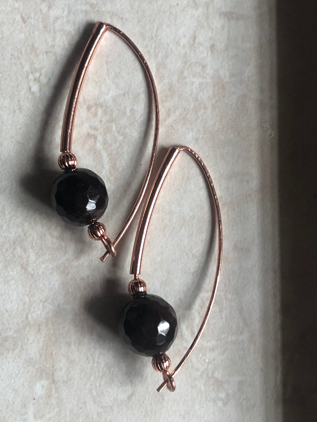 E145 Copper and 10mm Garnet “Around the Bend” earrings