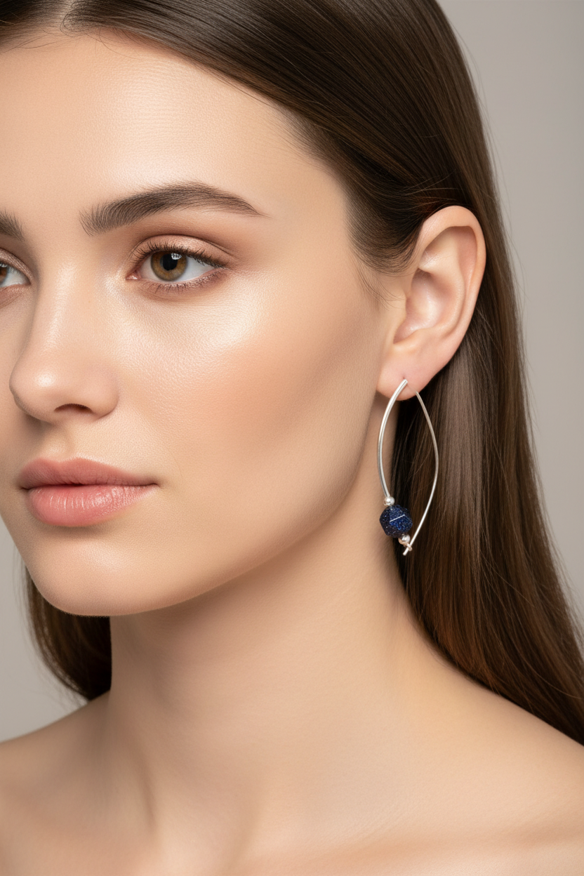 E146  ‘Around the Bend’ SS & Blue Goldstone earrings
