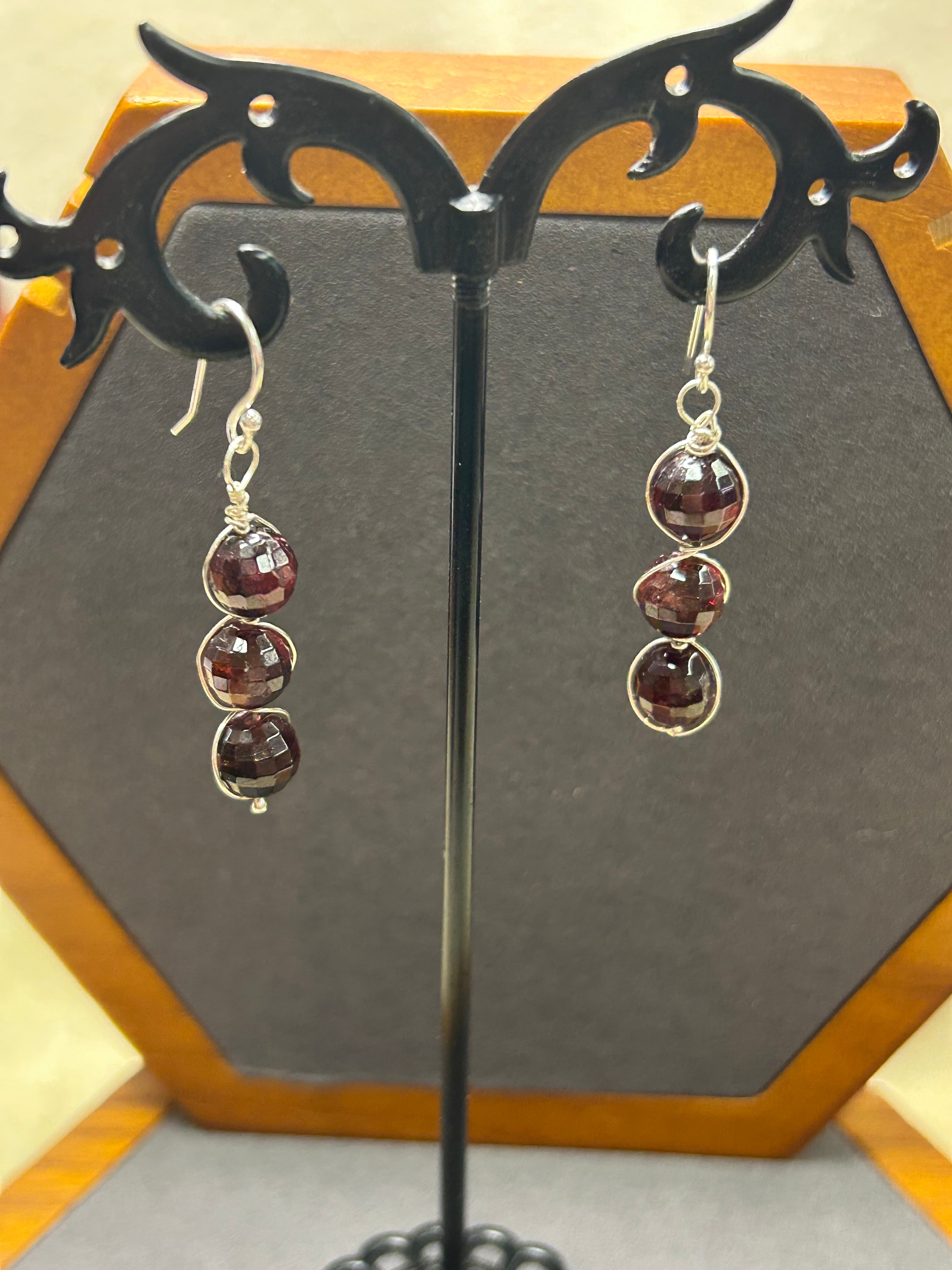 E128 SS wire wrapped triple 8 mm Garnets