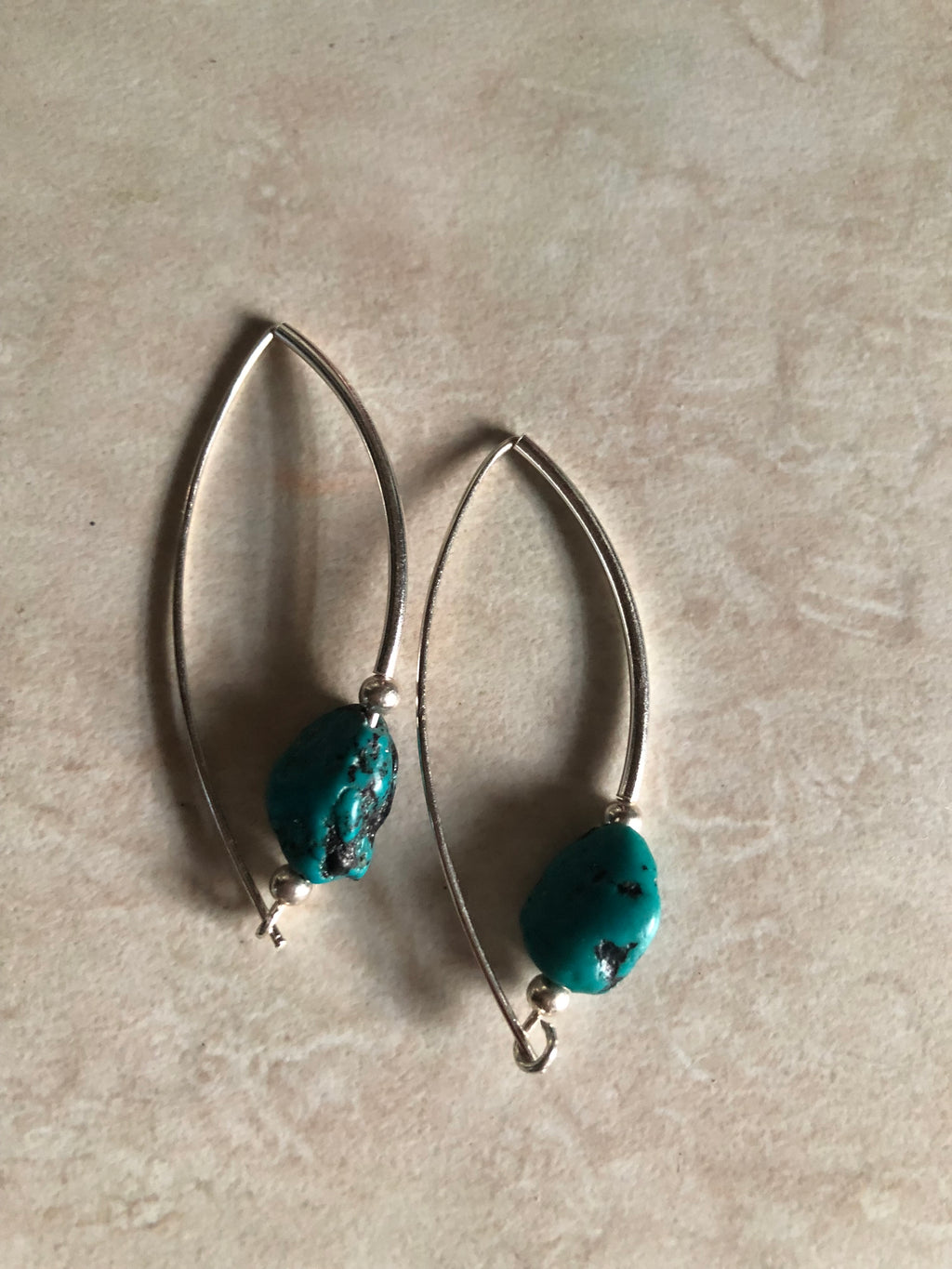 E147 ‘Around the Bend’ Sterling Silver & 12mm turquoise nuggets