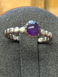R25  SS 6mm Amethyst set on Bead wire band size 7 ring