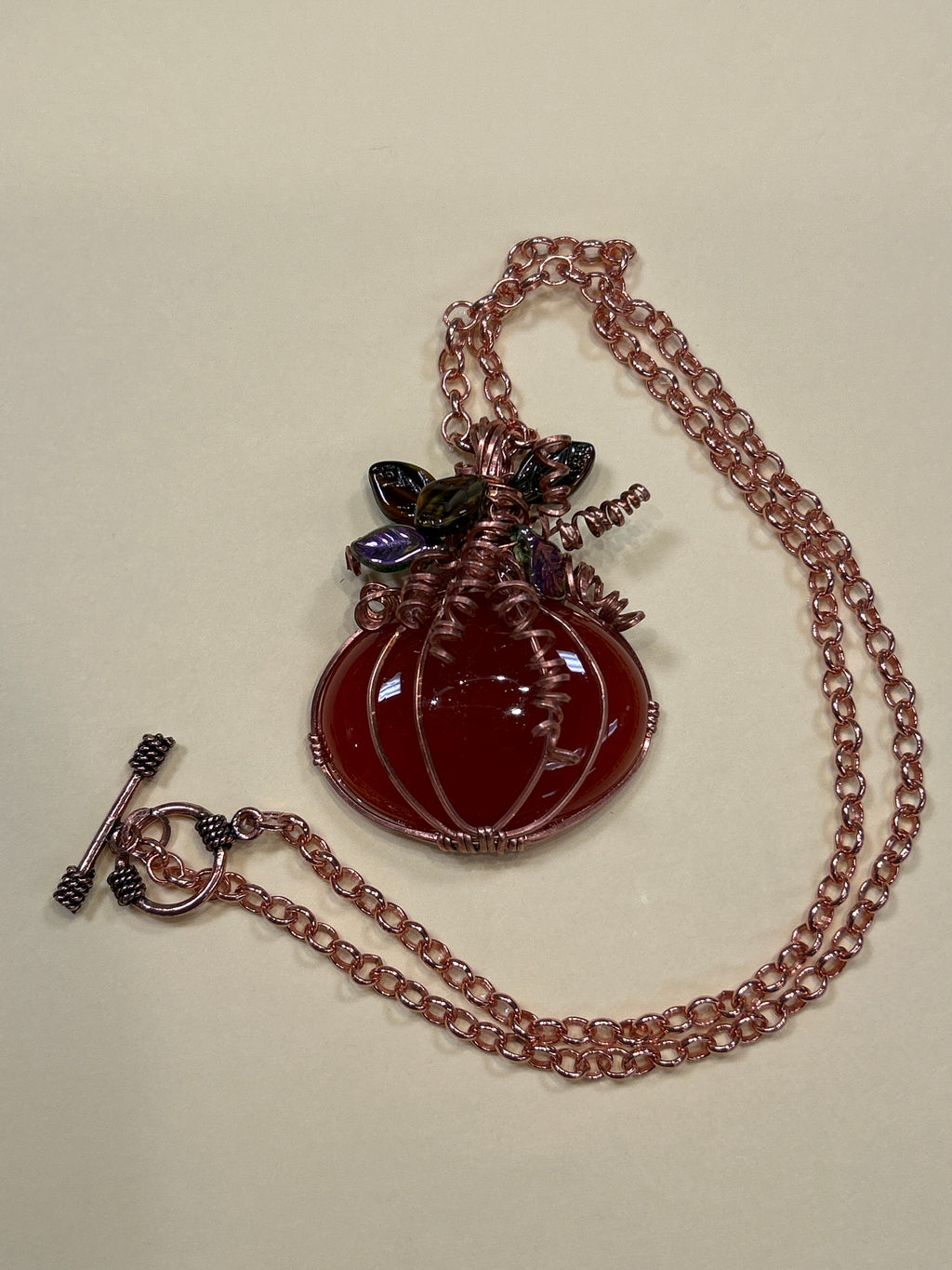 N38 Carnelian & Copper wrapped Pumpkin Pendant on 18” copper chain
