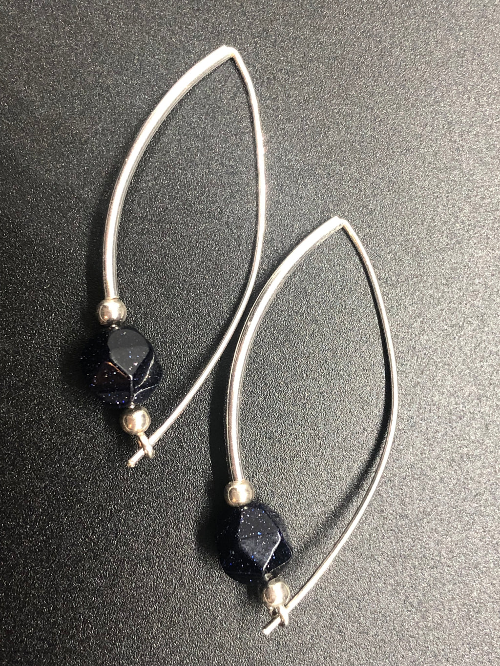 E146  ‘Around the Bend’ SS & Blue Goldstone earrings