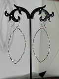 E168 Large SS wavy Diamond shaped Hoops