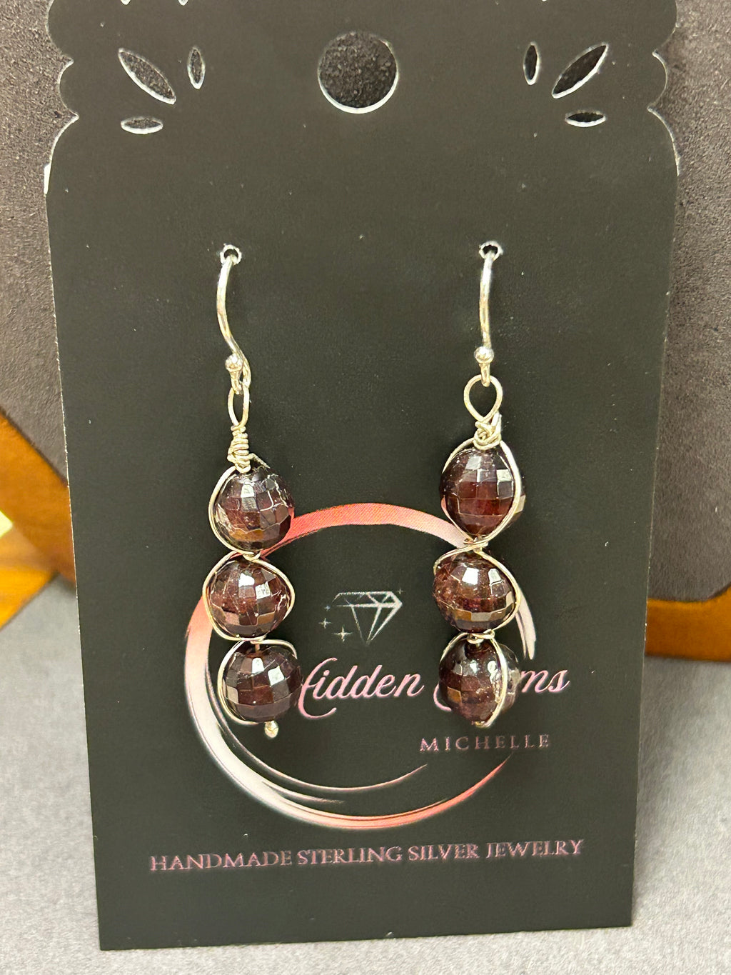 E128 SS wire wrapped triple 8 mm Garnets