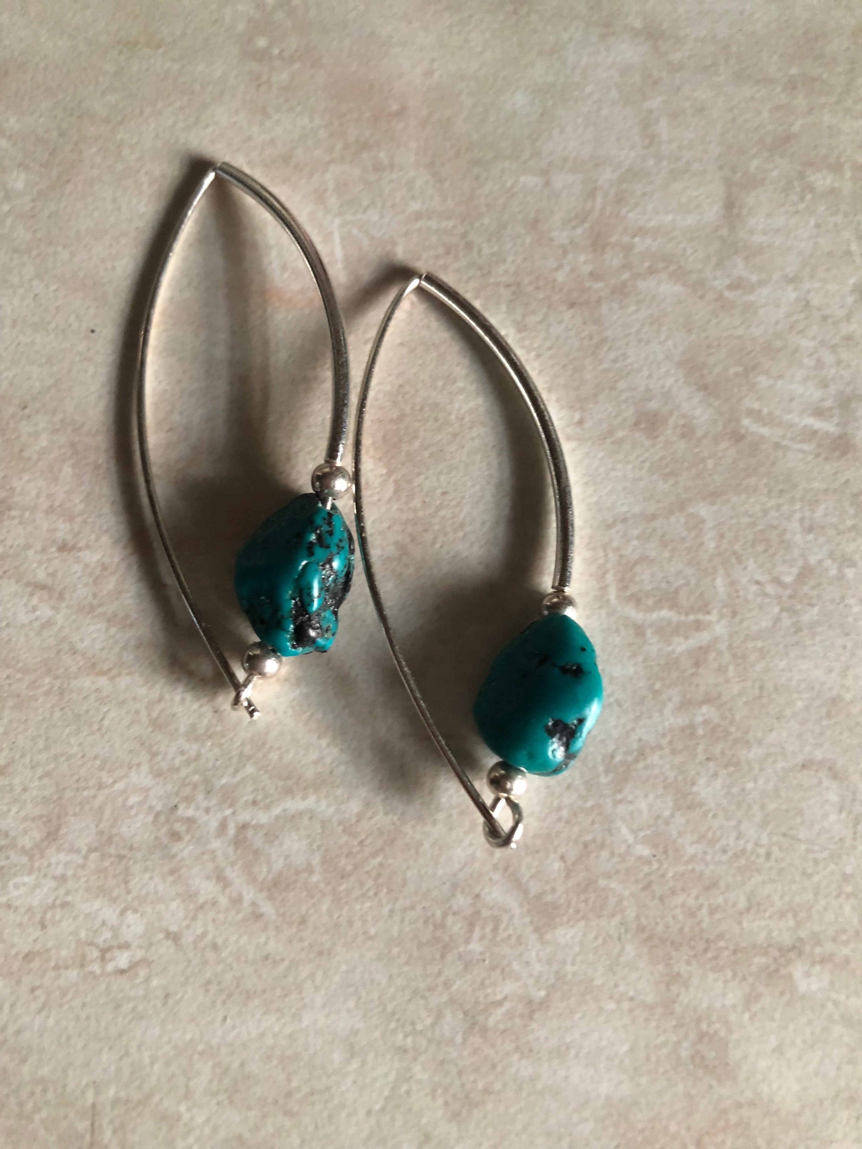 E147 ‘Around the Bend’ Sterling Silver & 12mm turquoise nuggets