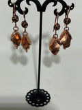 E60  Copper cascading disc earrings