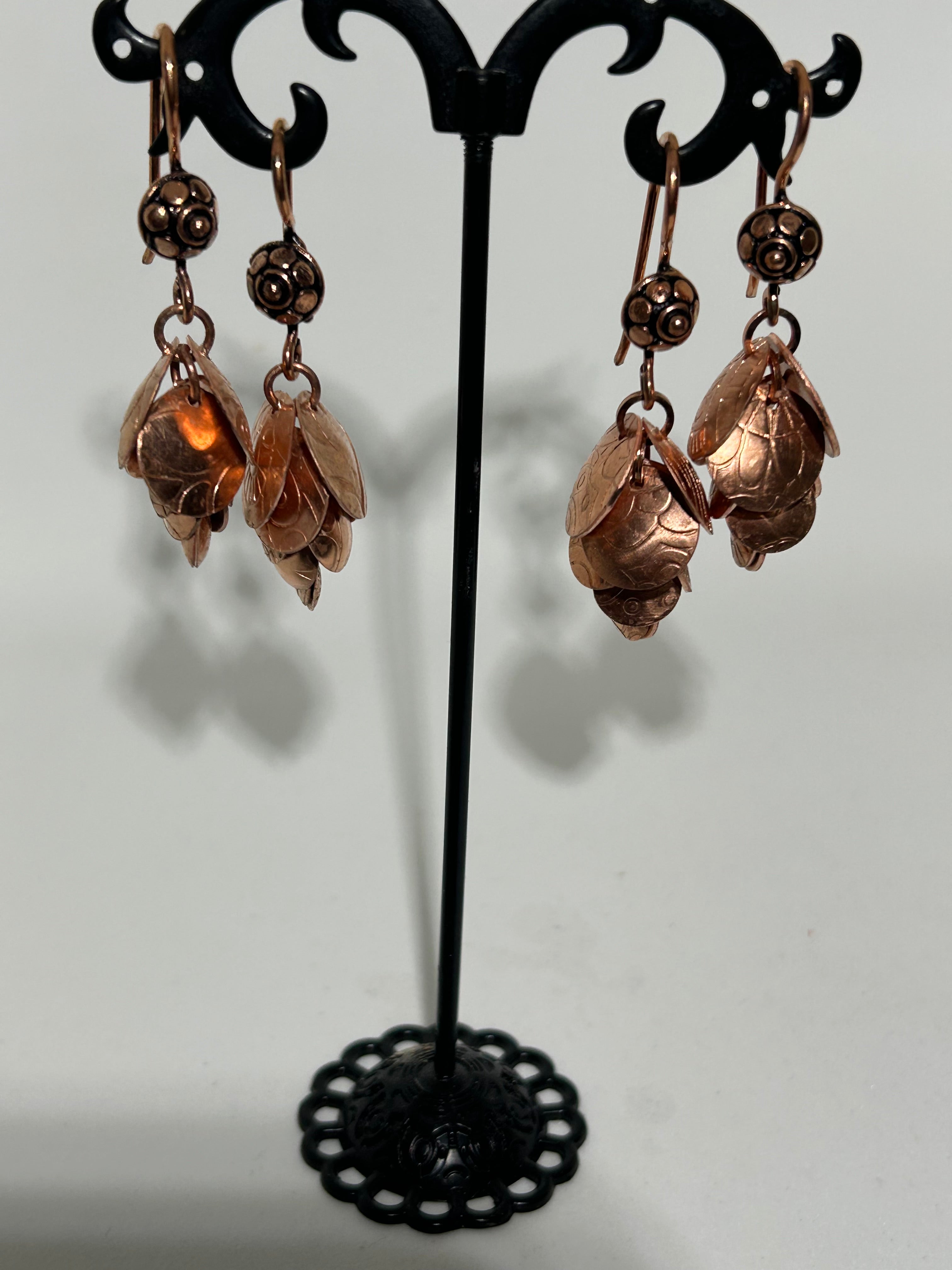 E60  Copper cascading disc earrings
