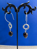 E136 SS Möbius & 11 mm Garnet earrings