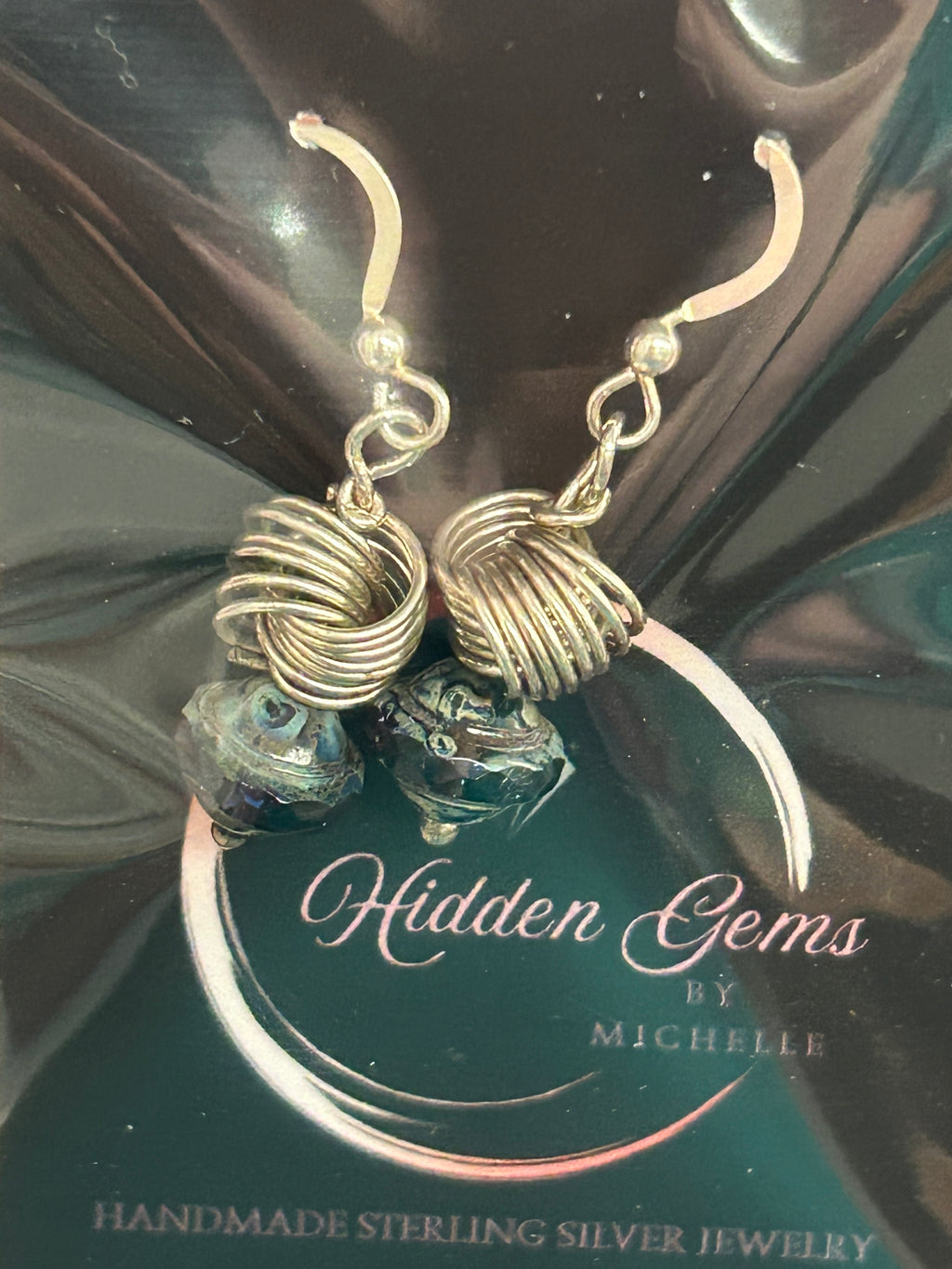 E80 SS Love Knot with Czech glass saturn bead